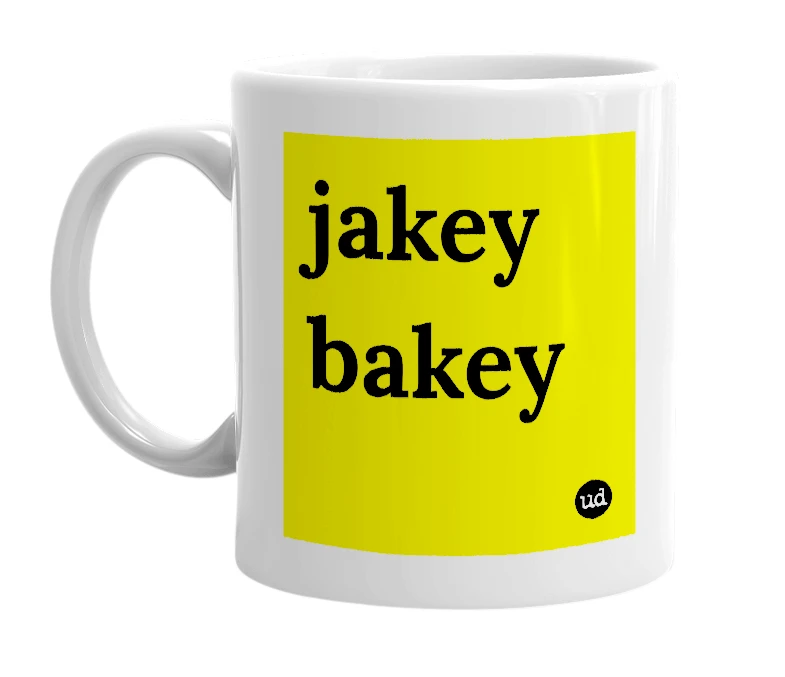 White mug with 'jakey bakey' in bold black letters