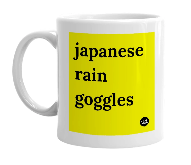 White mug with 'japanese rain goggles' in bold black letters
