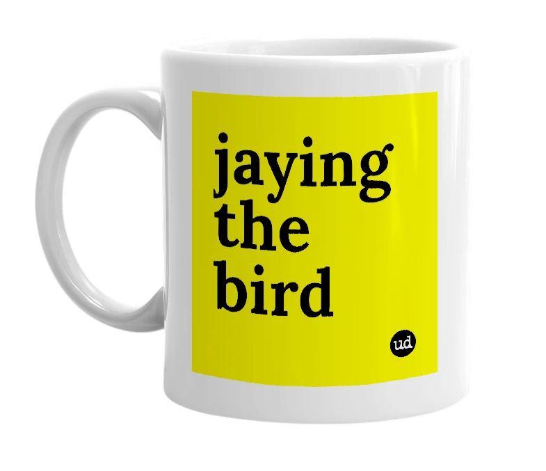 White mug with 'jaying the bird' in bold black letters