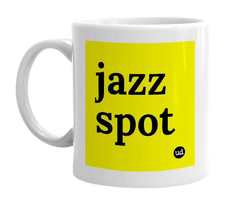 White mug with 'jazz spot' in bold black letters