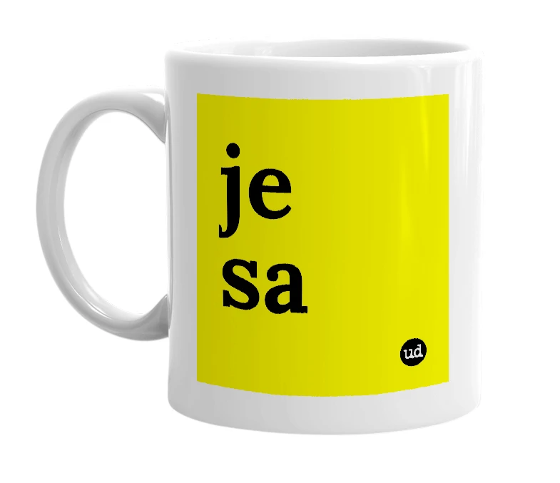 White mug with 'je sa' in bold black letters