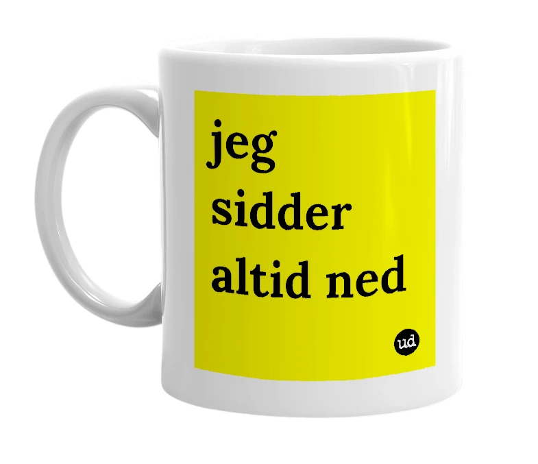 White mug with 'jeg sidder altid ned' in bold black letters