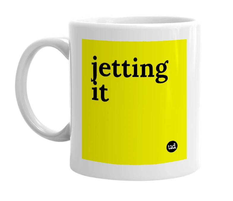 White mug with 'jetting it' in bold black letters