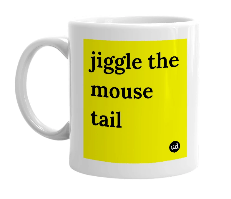 White mug with 'jiggle the mouse tail' in bold black letters