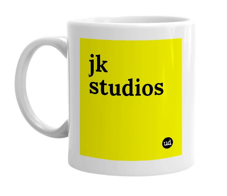 White mug with 'jk studios' in bold black letters