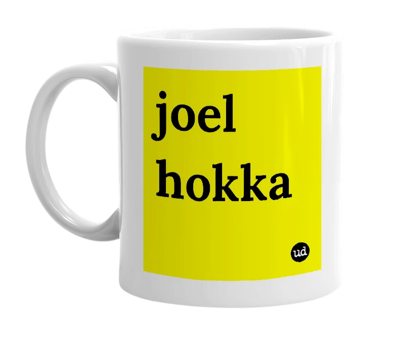 White mug with 'joel hokka' in bold black letters