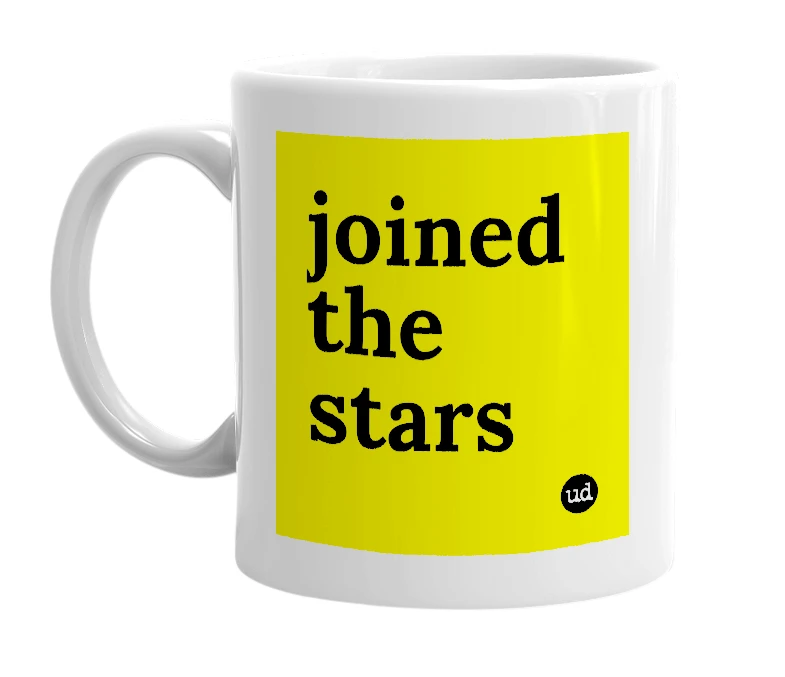 White mug with 'joined the stars' in bold black letters