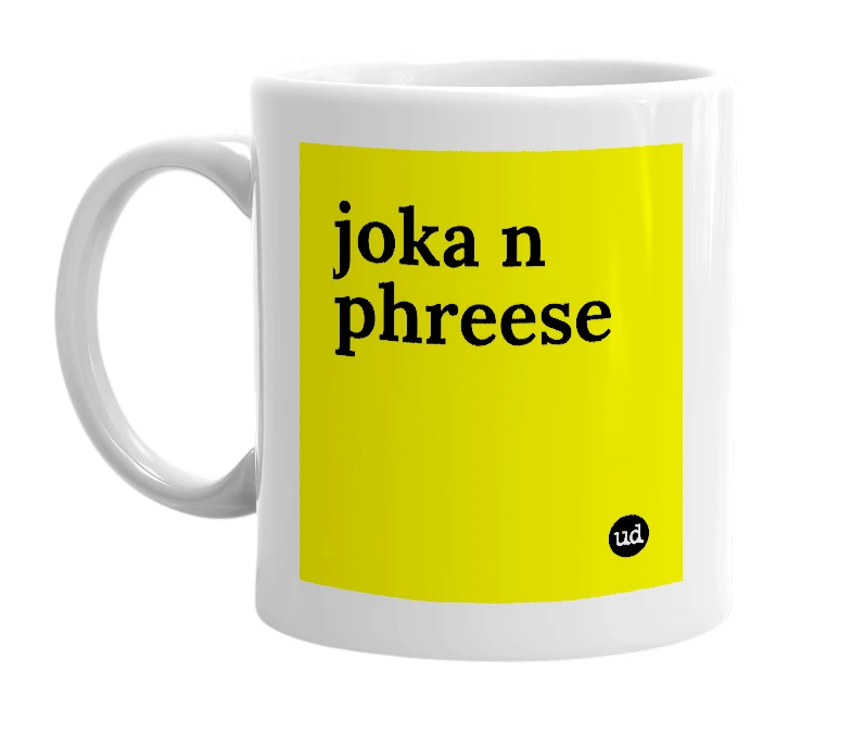 White mug with 'joka n phreese' in bold black letters