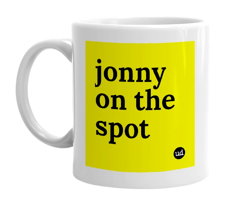 White mug with 'jonny on the spot' in bold black letters