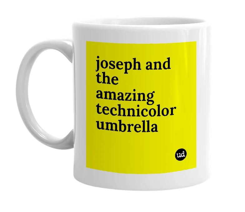 White mug with 'joseph and the amazing technicolor umbrella' in bold black letters