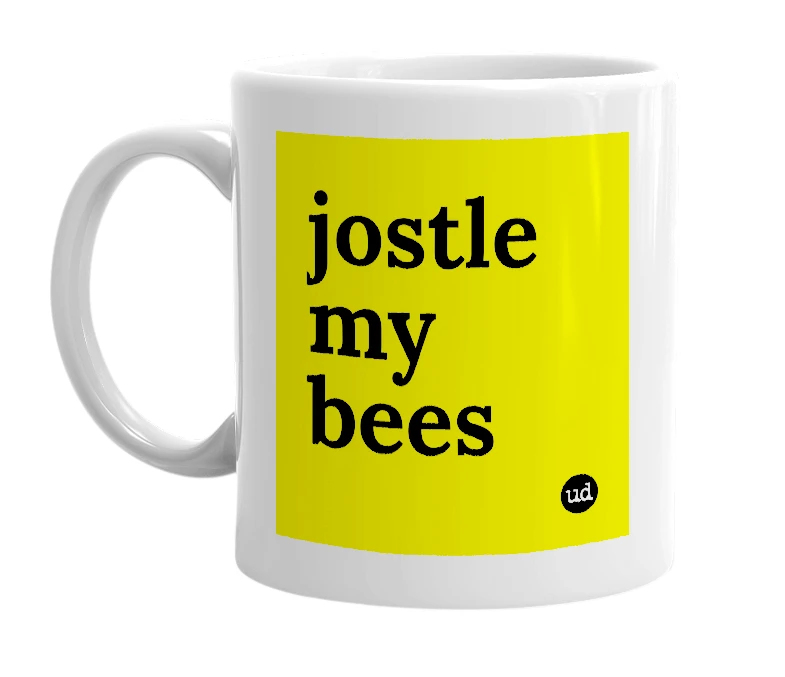 White mug with 'jostle my bees' in bold black letters