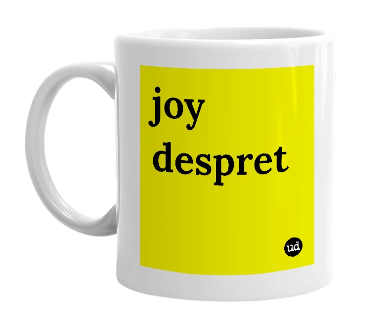 White mug with 'joy despret' in bold black letters