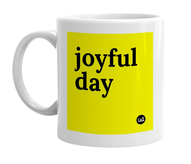 White mug with 'joyful day' in bold black letters