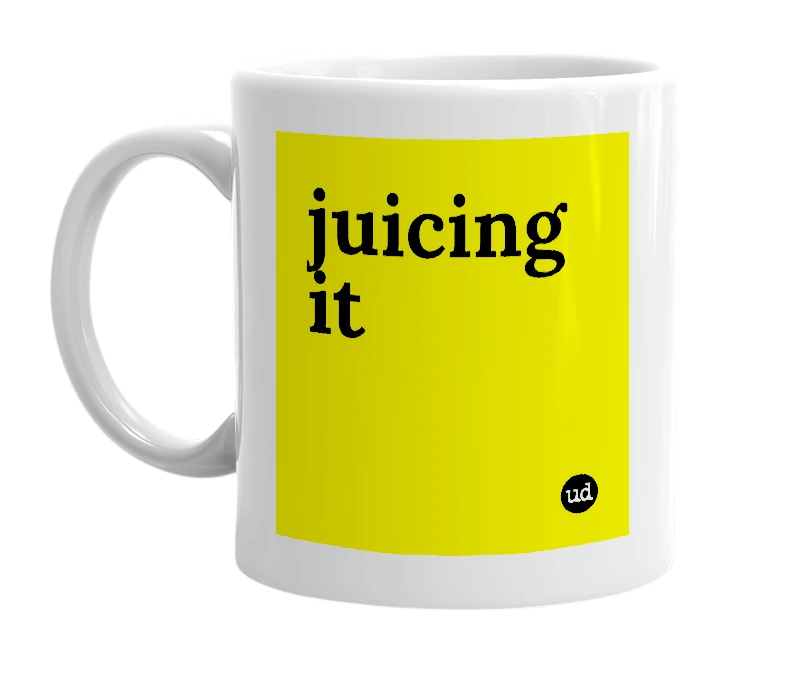 White mug with 'juicing it' in bold black letters