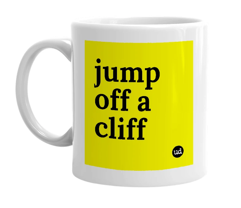 White mug with 'jump off a cliff' in bold black letters