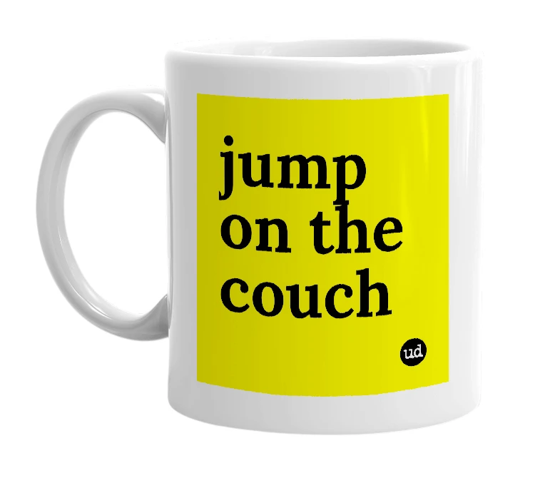 White mug with 'jump on the couch' in bold black letters