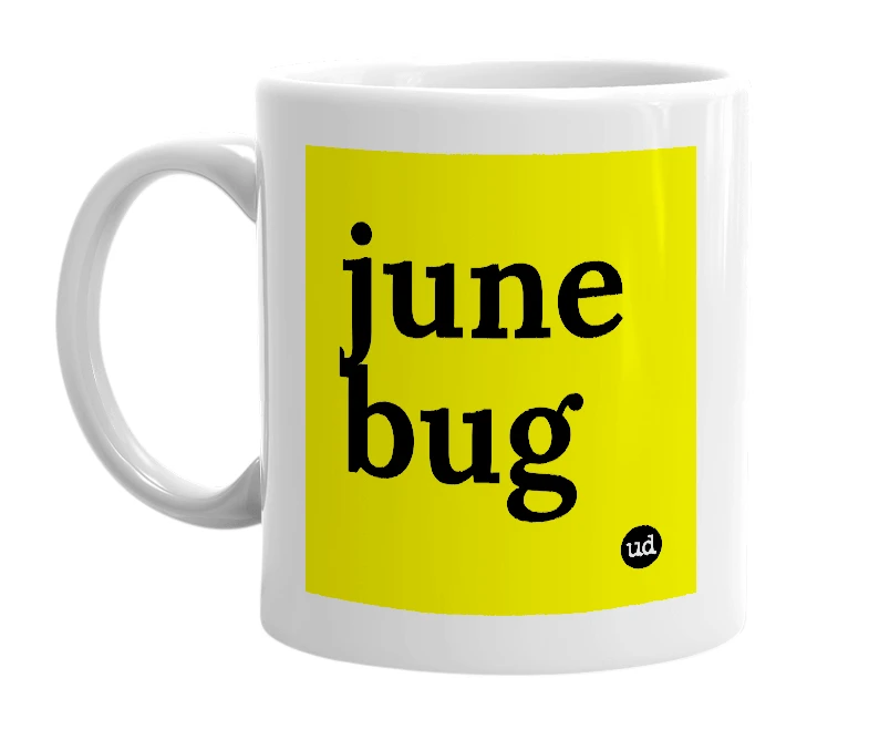 White mug with 'june bug' in bold black letters