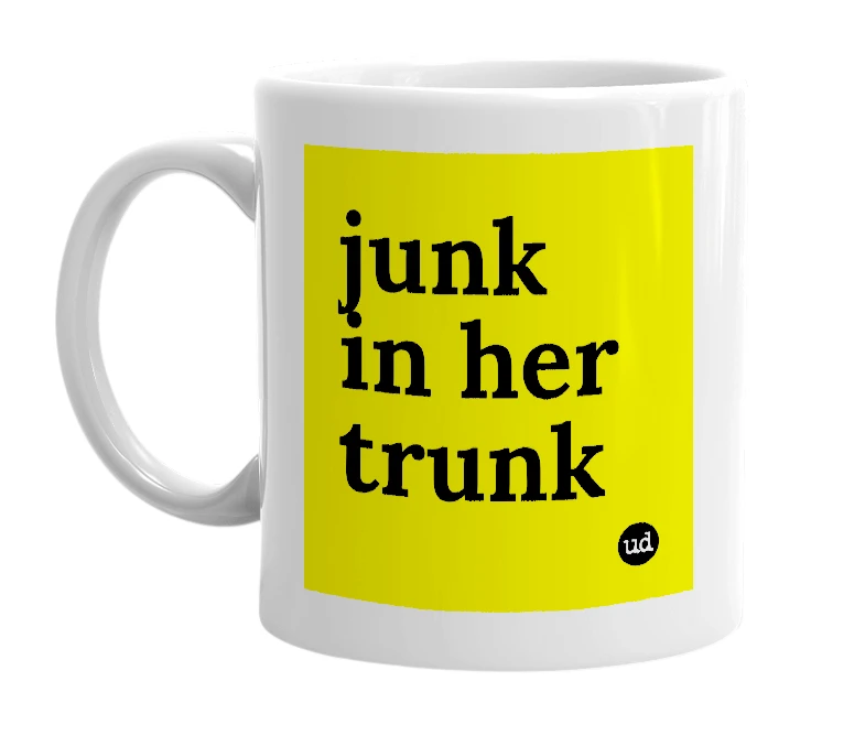 White mug with 'junk in her trunk' in bold black letters
