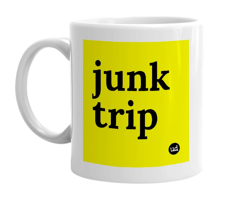 White mug with 'junk trip' in bold black letters