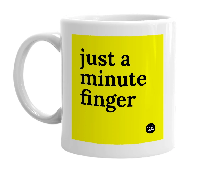 White mug with 'just a minute finger' in bold black letters