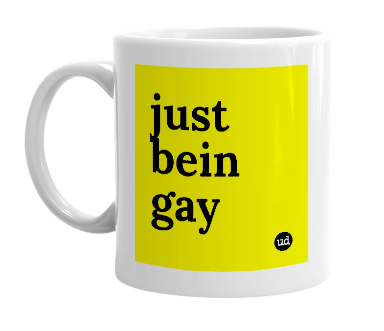 White mug with 'just bein gay' in bold black letters