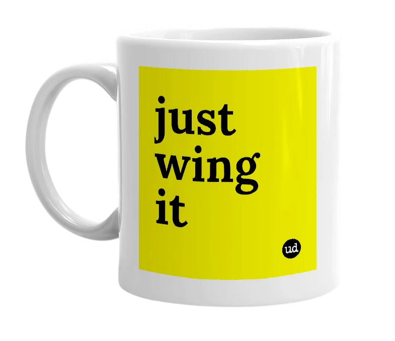 White mug with 'just wing it' in bold black letters