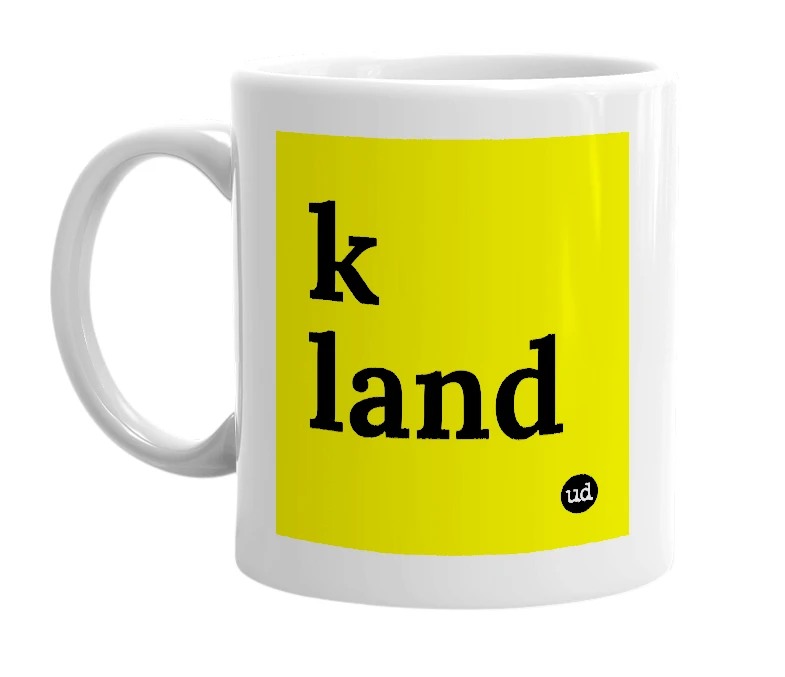 White mug with 'k land' in bold black letters