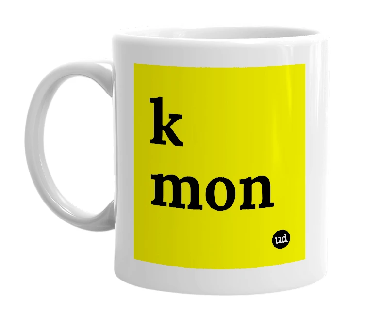 White mug with 'k mon' in bold black letters