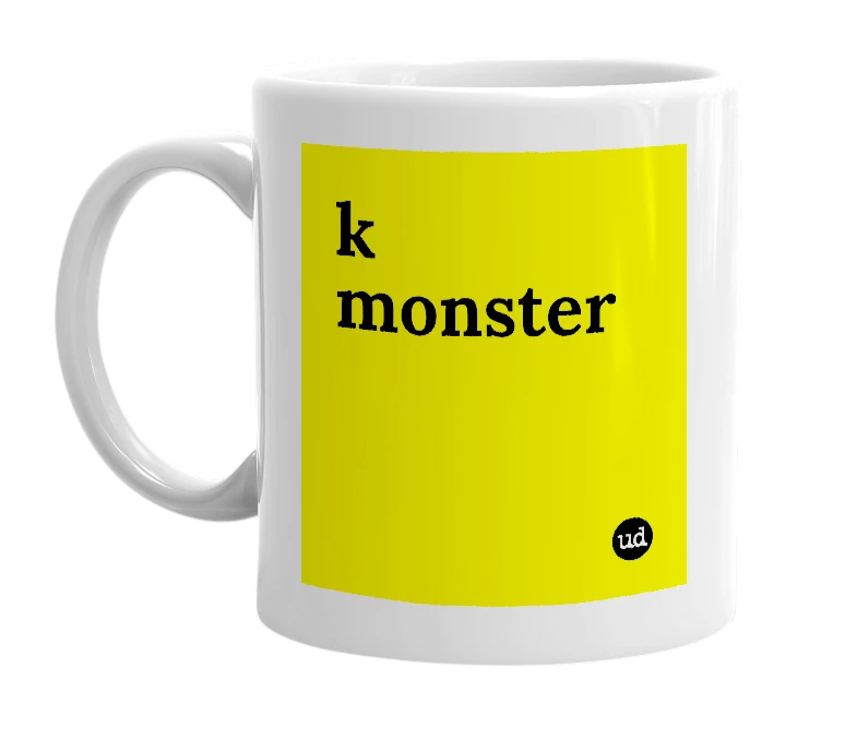 White mug with 'k monster' in bold black letters