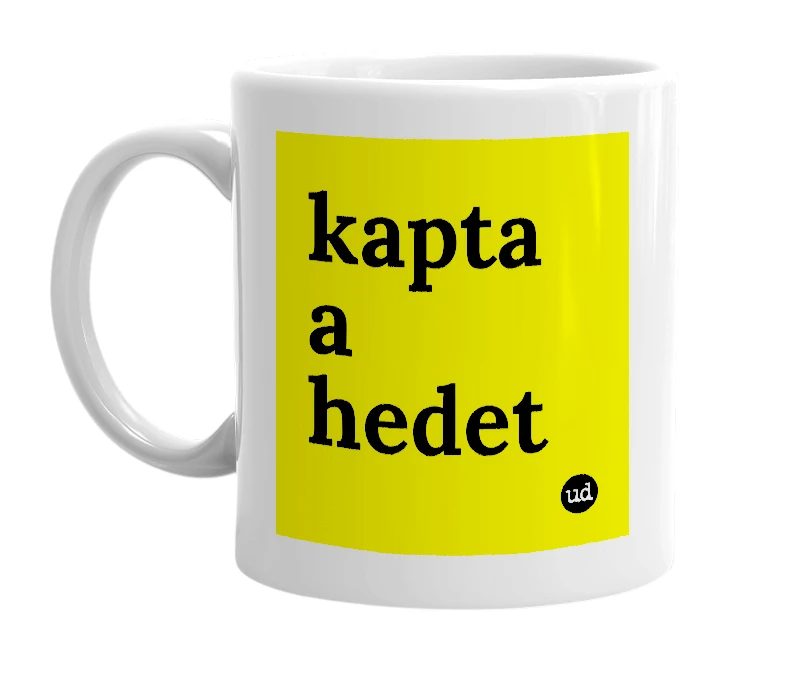White mug with 'kapta a hedet' in bold black letters
