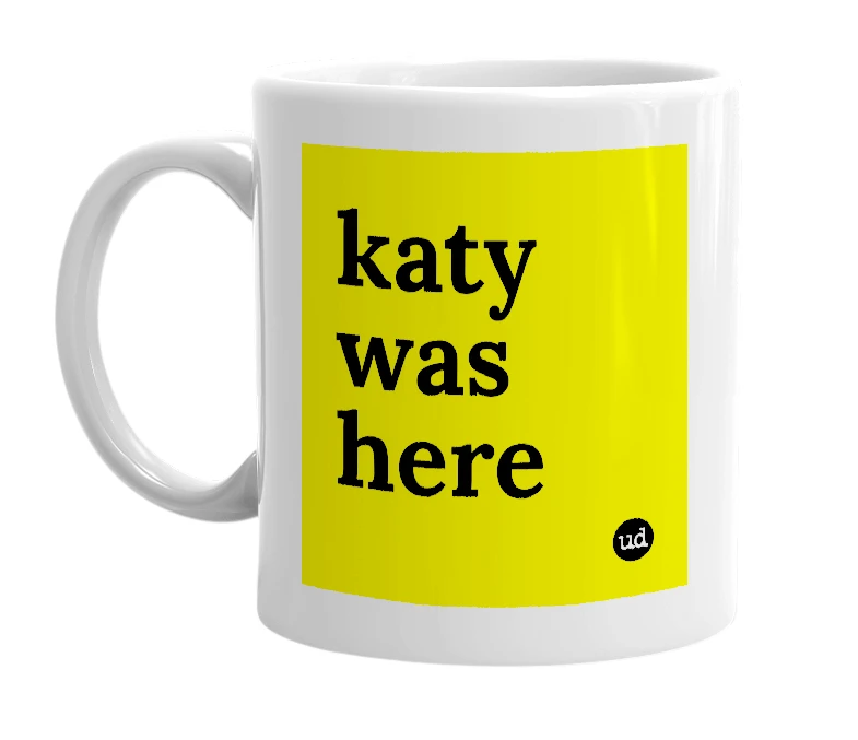 White mug with 'katy was here' in bold black letters
