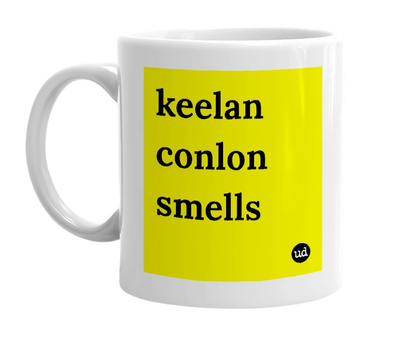 White mug with 'keelan conlon smells' in bold black letters