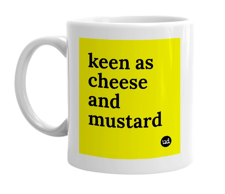White mug with 'keen as cheese and mustard' in bold black letters