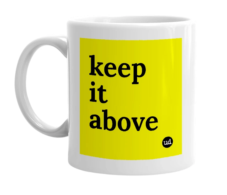 White mug with 'keep it above' in bold black letters