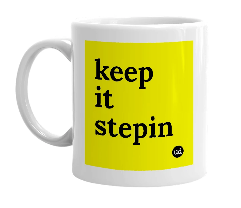 White mug with 'keep it stepin' in bold black letters