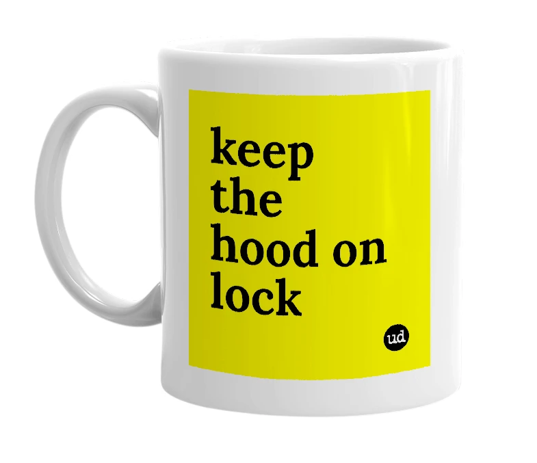 White mug with 'keep the hood on lock' in bold black letters