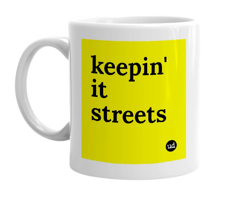 White mug with 'keepin' it streets' in bold black letters