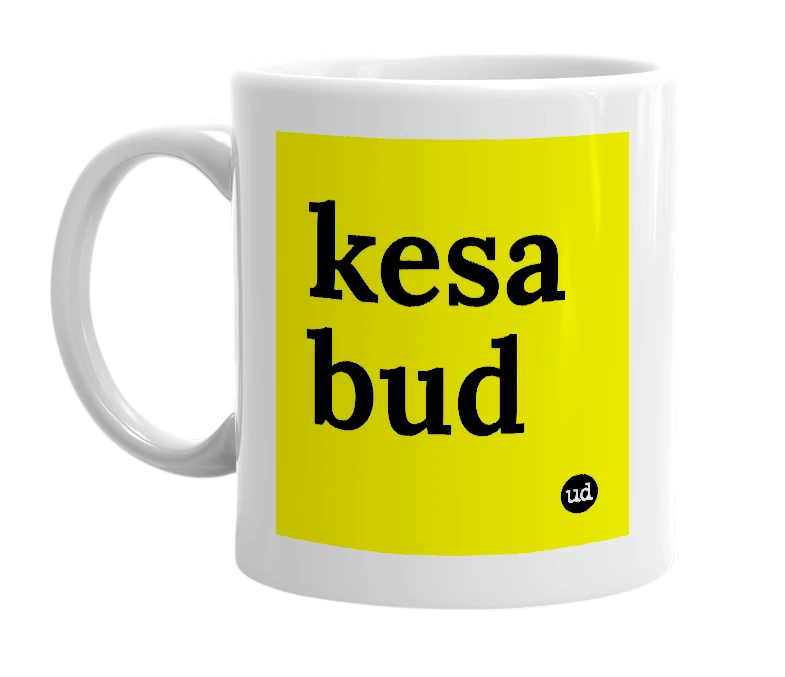 White mug with 'kesa bud' in bold black letters