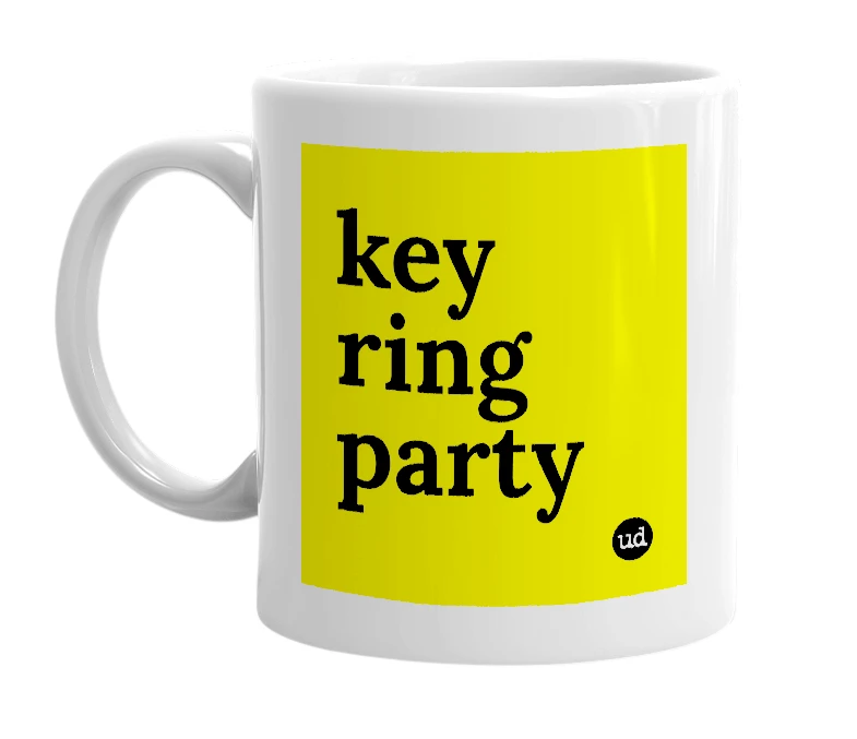 White mug with 'key ring party' in bold black letters