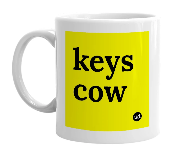 White mug with 'keys cow' in bold black letters