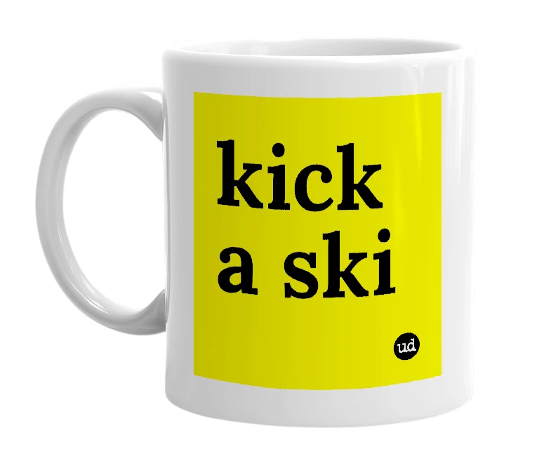 White mug with 'kick a ski' in bold black letters