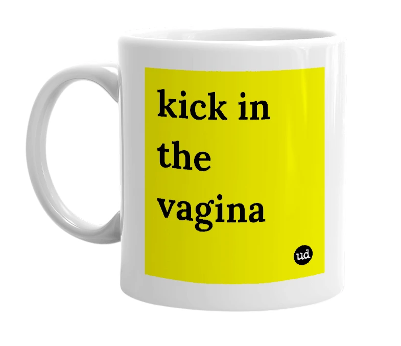 White mug with 'kick in the vagina' in bold black letters