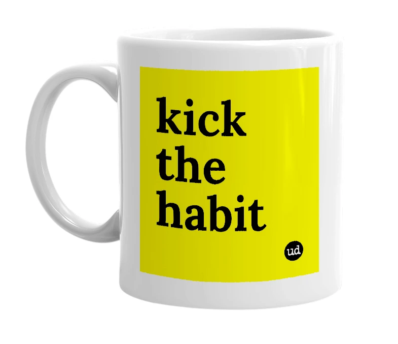 White mug with 'kick the habit' in bold black letters