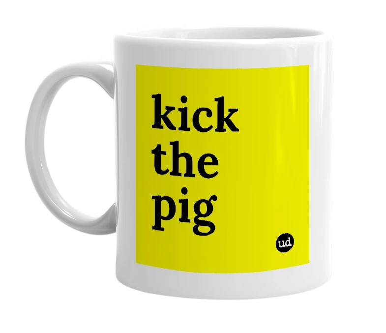 White mug with 'kick the pig' in bold black letters