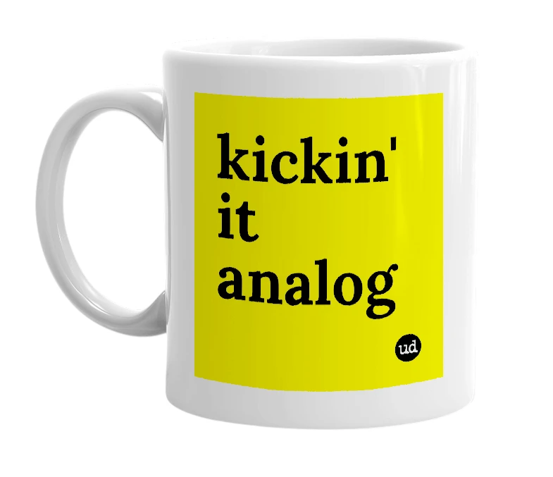 White mug with 'kickin' it analog' in bold black letters