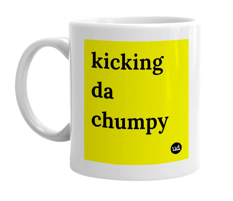 White mug with 'kicking da chumpy' in bold black letters