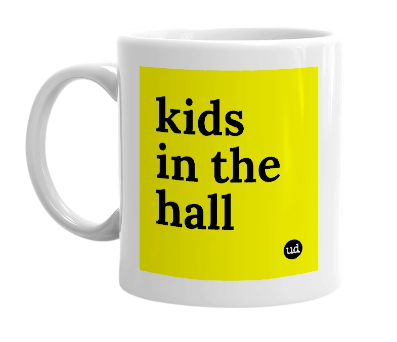 White mug with 'kids in the hall' in bold black letters