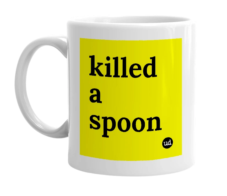 White mug with 'killed a spoon' in bold black letters