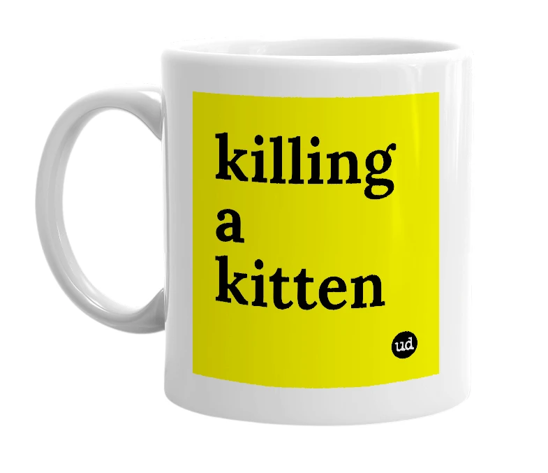 White mug with 'killing a kitten' in bold black letters