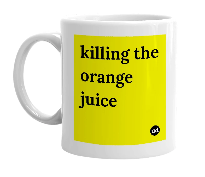 White mug with 'killing the orange juice' in bold black letters